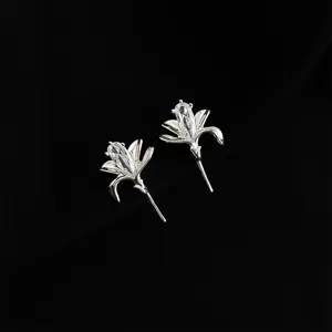 Elegant crystal flower clip-on earrings with shining clear zircon set in silver tone for women.