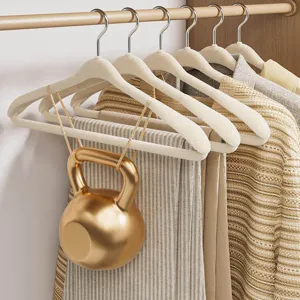 Beige velvet flocked clothes hangers with wide shoulders, non-slip design, heavy duty.