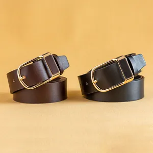 Close up detail of men PU leather belt with gold metal buckle, casual fashion accessory.