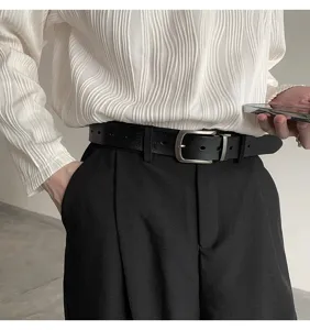 Men's casual black leather belt with silver pin buckle detail, stylish and durable accessory.