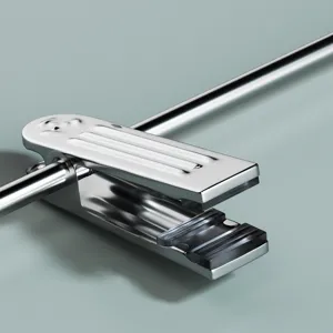 Stainless steel trousers hanger clip with anti slip grip pad for home clothes organizer.