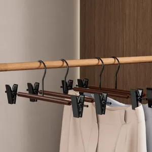 Perchas de madera maciza para pantalones con pinzas metalicas, perchas ahorradoras de espacio.