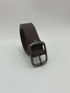 Dark brown faux leather belt detail, casual men's pin buckle waist belt close up view.