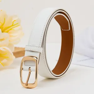White leather belt detail close-up showcasing the smooth gold pin buckle and neat stitching.