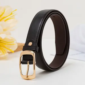 Close-up detail shot of a women's dark brown leather belt with a golden pin buckle.