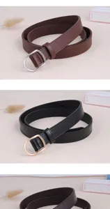 Vista dettagliata di cintura sottile in pelle da donna con fibbia in metallo a D, stile minimalista.