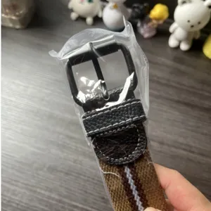 Women canvas belt with black pin buckle and striped strap casual jeans accessory.