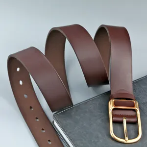 Detailed view of men's dark brown PU leather belt featuring elegant gold metal buckle.
