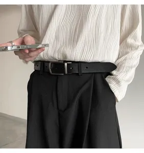 Men's casual leather belt detail shot, featuring classic pin buckle and smooth finish.