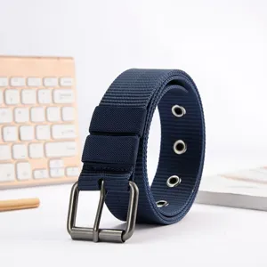 Detail view of the dark blue woven canvas belt featuring a sturdy metal buckle and eyelets.