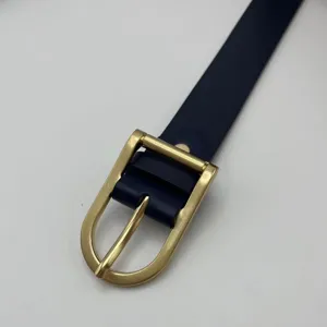 Women's minimalist TPU leather dress belt with elegant gold-tone metal pin buckle daily wear.