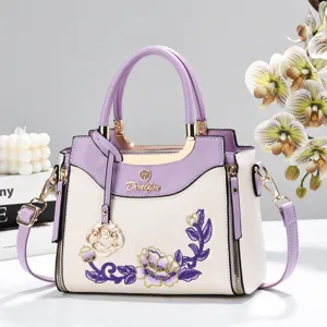 Elegant Chinese style embroidered women handbag, trendy PU leather crossbody shoulder bag.