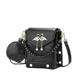 Sac bandoulière noir motif crocodile avec porte-monnaie rond et élégant décor de cygne.