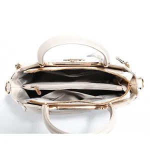 Elegant beige women handbag with gold hardware and multiple zipper compartments.
