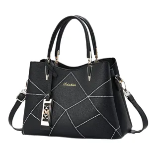 Classic black leather handbag for women, top handle shoulder bag with stylish white stitching.