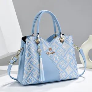 Light blue embroidered women handbag shoulder crossbody bag with tassel and gold hardware detail
