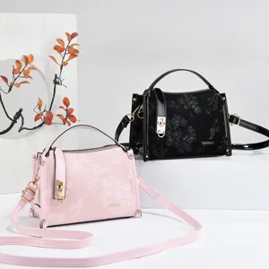 Stylish printed box shoulder handbag for women, casual crossbody bag with elegant floral pattern.