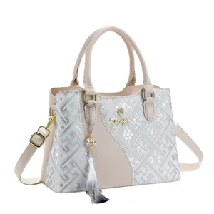 Chic Chinese style women handbag with top handle and elegant tassel pendant for daily use.