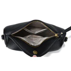 Black leather shoulder bag for women, minimalist underarm hobo bag with gold hardware.