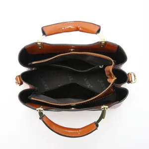 Detailed top view of women's multi-compartment tote bag interior structure and design.
