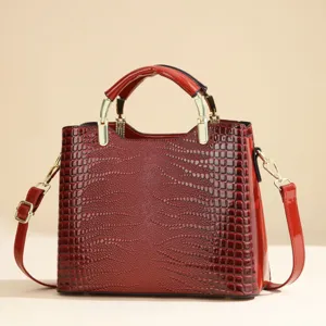 Elegant women's PU leather crocodile pattern handbag, stylish red shoulder tote bag for use.
