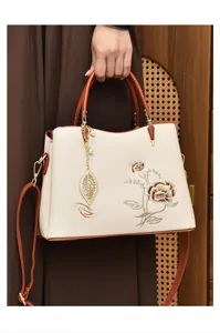 Detailed view of the elegant Chinese style embroidered women handbag with elegant floral patterns.