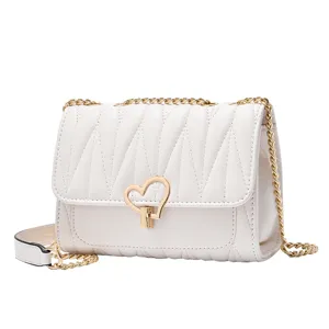Chic white quilted shoulder bag with gold chain and heart lock for women, fashionable crossbody.