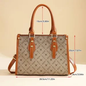 Brown leather tote bag for women, large capacity commuter shoulder handbag with retro monogram.