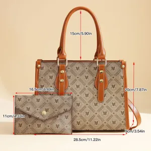 Stylish brown monogram tote bag and matching envelope clutch set with clear dimension guides.