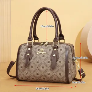 Detailed view of brown vintage monogram pillow handbag with metal hardware and dimensions.
