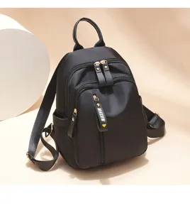 Black oxford cloth women's backpack, large capacity fashionable casual travel school bag.
