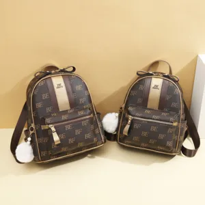 Stijlvolle bruine monogram reisrugzak voor dames, grote capaciteit dagelijkse casual schooltas.