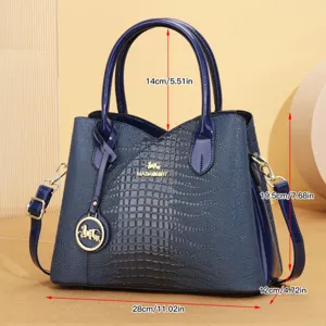 Borsa tote in pelle verniciata goffrata coccodrillo blu con manico e tracolla regolabile.