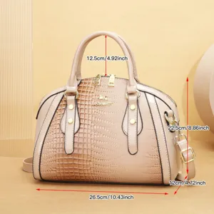 Élégant sac à main beige pour femme avec texture crocodile et détails en métal doré.