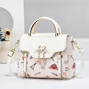 Detailed view of women fashion casual handbag with chic print and elegant swan metal buckle.