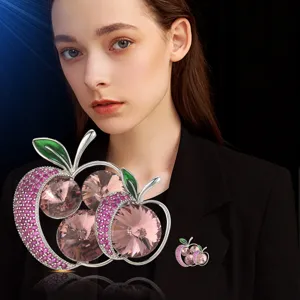 Elegant crystal apple brooch for women, sparkling rhinestone lapel pin for suit and dress.