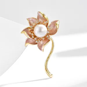 Elegant lotus freshwater pearl brooch, premium enamel gold-tone flower coat accessory for women.