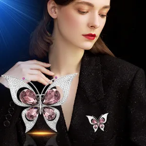Elegant crystal zircon butterfly brooch for women, sparkling fashion coat pin jewelry.