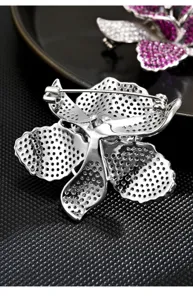 Exquisite orchid brooch detail showing back pin structure and hollow rhinestone back finish.