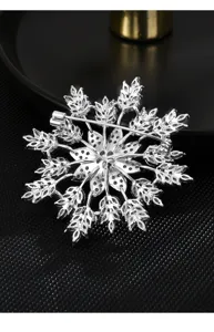 Detailed back view of a silver-toned snowflake brooch featuring micro-set cubic zirconia.