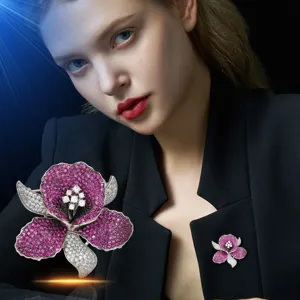Stunning pave pink and white cubic zirconia orchid brooch pin for women suit jacket dress.