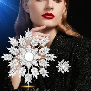 Stunning copper micro-pave zirconia pearl snowflake brooch pin, elegant fashion jewelry accessory.
