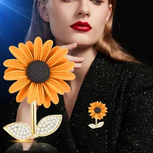 Elegant sunflower brooch with vibrant enamel petals and sparkling crystal leaves for daily wear.