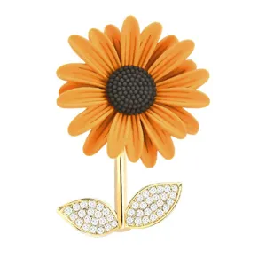 Chic enamel sunflower brooch with sparkling pavé leaves, elegant floral fashion jewelry.
