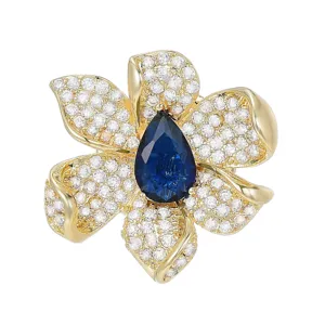 Gold flower magnetic brooch with pear blue stone and crystal paved petals for shirt anti-glare