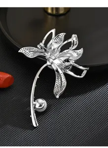 Exquisite crystal flower brooch detail view, silver tone metal backing with secure safety pin.