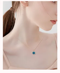 Close-up detail view of the elegant square crystal clavicle necklace, chic accessory.
