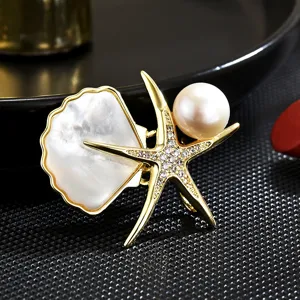 Spilla a Stella Marina in Madreperla Naturale e Perla d'Acqua Dolce Elegante Accessorio per Abito da Donna Rame Strass