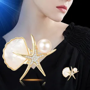 Elegante spilla a stella Marina in madreperla naturale e perla per abito da donna elegante.