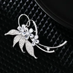 Elegant micro-set zircon brooch for women, luxury floral pin accessory for chic daily wear.